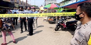 Reka ulang kejadian premanisme di Pasar Jepon Kabupaten Blora. (Lilik Yuliantoro / Lingkarjateng.id)