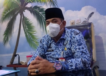 MENJELASKAN: Kepala Dinas Kelautan dan Perikanan Kabupaten Demak Mohamad Fathkurokhman, saat ditemui di ruangannya baru-baru ini. (M. Elang Ade Iswara/Lingkarjateng.id)