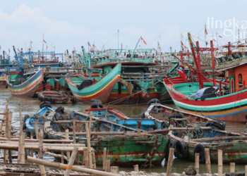 BERSANDAR: Kapal-kapal tambat labuh di Pelabuhan Perikanan Pantai Tasikagung.