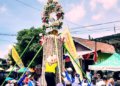 MERIAH: Tradidi Meron di Kecamatan Sukolilo, Kabupaten Pati berlangsung meriah dengan mengarak 14 gunungan. (Arif Febriyanto/Lingkarjateng.id)