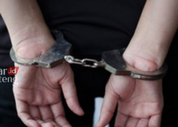 ILUSTRASI: Pelaku pencurian diborgol. (Istimewa/Lingkarjateng.id)
