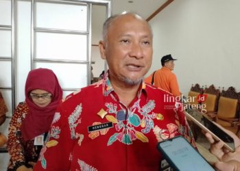 SOAL TUNJANGAN RT/RW: Pj Bupati Pati, Henggar Budi Anggoro saat ditemuinya usai pertemuan dengan DPRD pada Jumat, 18 Agustus 2023. (Arif Febriyanto/Lingkarjateng.id)