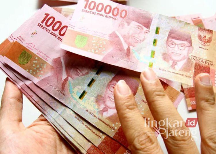 ILUSTRASI: Uang rupiah pecahan Rp100.000. (Antara/Lingkar.news)