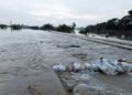 Banjir akibat jebolnya tanggul Sungai Tuntang di Desa Baturagung, Kecamatan Gubug, Kabupaten Grobogan, pada Minggu, 9 Maret 2025. (Ahmad Abror/Lingkarjateng.id)