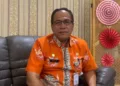 Plt Kepala Dinas Sosial Pemberdayaan Perempuan dan Perlindungan Anak (Dinsos P2PA) Kabupaten Demak, Agus Herawan. (M. Burhanuddin Aslam/Lingkarjateng.id)