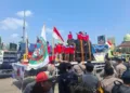 Sejumlah truck dari beberapa daerah di Jateng saat memggelar unjuk rasa di depan Kantor Dishub Jateng, Senin, 23 Juni 2025. (Rizky Syahrul/Lingkarjateng.id)