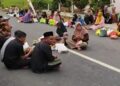 Warga Desa Karangwono, Kecamatan Tambakromo, Kabupaten Pati, syukuran atas perbaikan jalan, Senin, 24 November 2025. (Lingkarnews Network/Lingkarjateng.id)