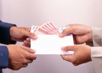 Ilustrasi upah minimum. (Canva)