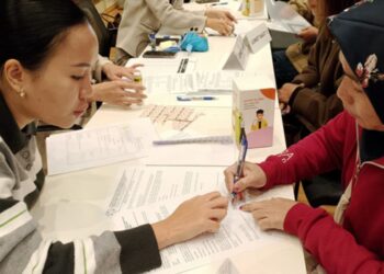 Proses administrasi penyaluran bantuan korban kebakaran Apartemen Tai Po Hong Kong. (Dok. Pribadi/Lingkarjateng.id)