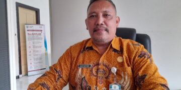 Bidang Iwasbang Badan Kesbangpol Kendal Komitmen Optimalkan Peran dan Fungsinya 10 Kabid Iasbang Badan Kesbangpol Kendal, Kardiyantomo, saat ditemui di ruang kerjanya pada Jumat, 27 Februari 2026. (Anik Kustiani/Lingkarjateng.id)