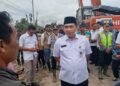 Wakil Gubernur Jawa Tengah Taj Yasin Maimoen turun langsung meninjau percepatan perbaikan tanggul Sungai Tuntang yang jebol di Desa Tinanding, Kecamatan Godong, Kabupaten Grobogan, Rabu, 18 Februari 2026. (Humas Pemprov Jateng/Lingkarjateng.id)