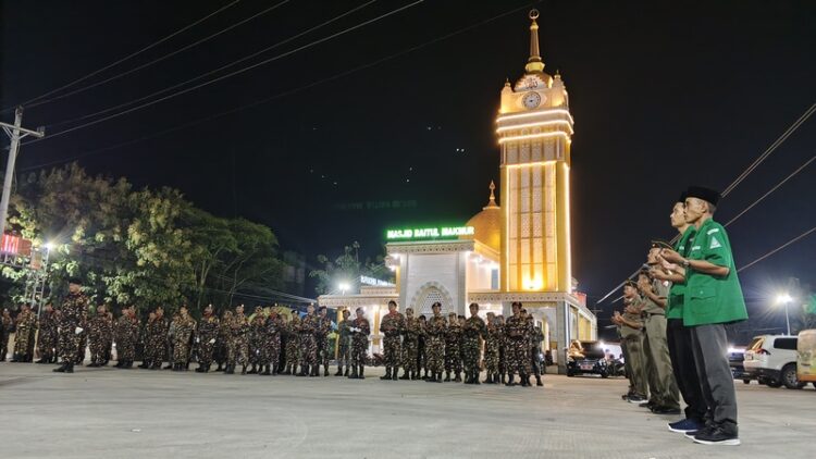 KHIDMAT: Pembukaan giat posko mudik GP Ansor yang digelar, Senin (16/03/2026) malam. Foto : Eko Wicaksono / Lingkar Jateng