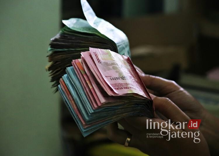 Daftar Lengkap Dana Desa di Pati Tahun 2026, Tertinggi Rp373 Juta 25 Ilustrasi uang dana desa. (Unsplash-Mufid Majnun/Lingkarjateng.id)