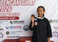 Pesilat kecil Wingga Abigail Chavali Megaz menunjukkan medali perunggu yang diraihnya usai mengikuti kompetisi Bupati Cup 2026 di Jepara. Foto : Dok. Pribadi Wingga/Lingkar