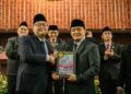 Gubernur Jawa Tengah Ahmad Luthfi menerima hasil pemeriksaan laporan keuangan pemerintah daerah dari Badan Pemeriksa Keuangan pada Senin, 8 Juni 2026. (Humas Pemprov Jateng/Lingkarjateng.id)