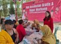 PDI Perjuangan Kendal Kembali Gelar Cek Kesehatan dan Makan Siang Gratis di Weleri 35 Wakil Ketua Bidang Pariwisata, Pemuda dan Olahraga PDI Perjuangan Kabupaten Kendal, Nattaya Kenenza meninjau kegiatan Cek Kesehatan Gratis (CKG) dan makan siang gratis Dapur Marhaen yang digelar di Taman Kota Weleri, Kecamatan Weleri, Kabupaten Kendal, Senin, 10 Agustus 2026. (Dok. Pribadi/Lingkarjateng.id)