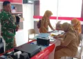 Tim Dinas Koperasi, UKM dan Tenaga Kerja Kabupaten Pekalongan melakukan verifikasi dan validasi kesiapan Gerai Koperasi Desa Merah Putih Karangdowo, Kecamatan Kedungwuni, Senin, 28 September 2026. (Fahri Akbar/Lingkarjateng.id)