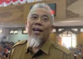 Kepala BPKAD Pati, Febes Mulyono, memberi keterangan kepada awak media usai audiensi bersama Komisi B DPRD Pati dan GJL Jawa Tengah di gedung dewan setempat, Selasa, 1 September 2026. (Fahtur Rohman/Lingkarjateng.id)