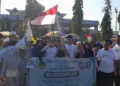 Bupati Kendal, Dyah Kartika Perpanasari, berfoto bersama peserta Jalan Sehat Santri dalam rangka peringatan HSN di Stadion Utama Kebondalem Kendal, Minggu, 18 Oktober 2026. (Anik Kustiani/Lingkarjateng.id)