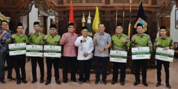 Pemerintah Kabupaten Kudus memberikan apresiasi terhadap Kontingen Kudus yang berprestasi di MTQ Nasional 2026 di Pendopo Kabupaten Kudus, Jumat, 2 Oktober 2026. (Nisa Hafizhotus Syarifa/Lingkarjateng.id)